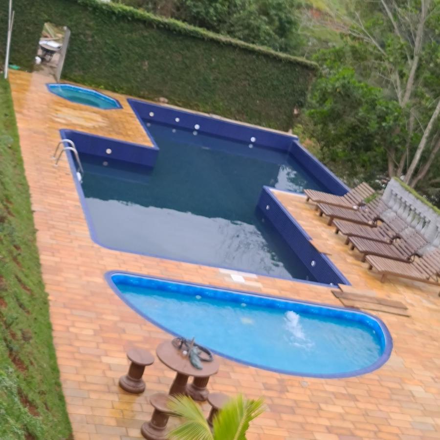 Pousada Nossa Senhora Penedo  Exterior photo Swimming pool at the resort