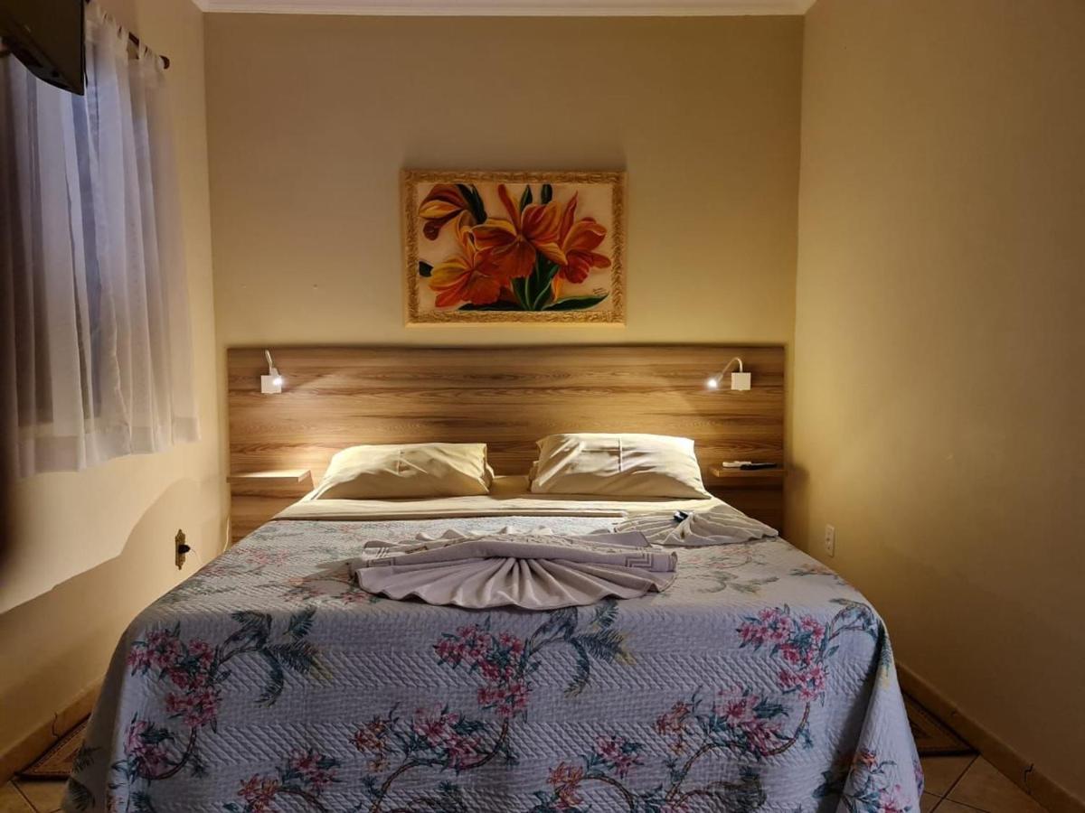 Pousada Nossa Senhora Penedo  Exterior photo A bedroom in a hotel in Brazil