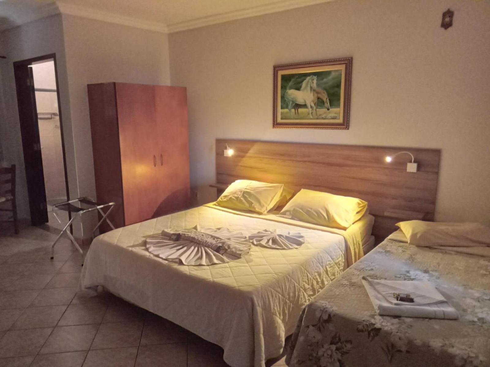 Pousada Nossa Senhora Penedo  Room photo A bedroom in a hotel