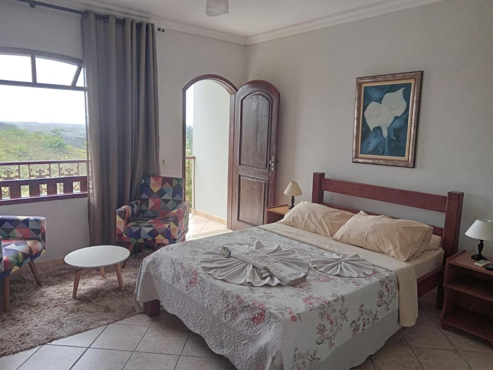 Pousada Nossa Senhora Penedo  Room photo A bedroom in a hotel