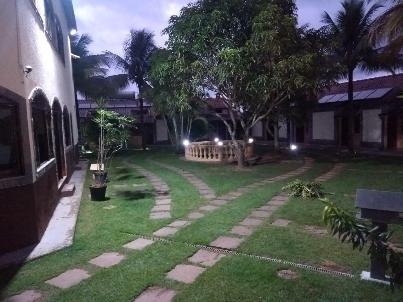 Pousada Nossa Senhora Penedo  Exterior photo The garden of the hotel