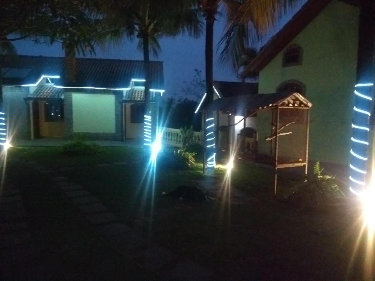 Pousada Nossa Senhora Penedo  Exterior photo A view of the resort at night